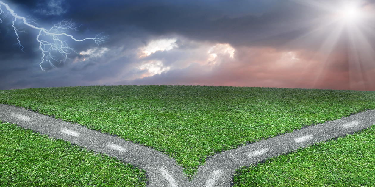 Grassy field with a forked road, stormy clouds and lightning on the left, bright sun on the right, symbolizing a difficult choice.